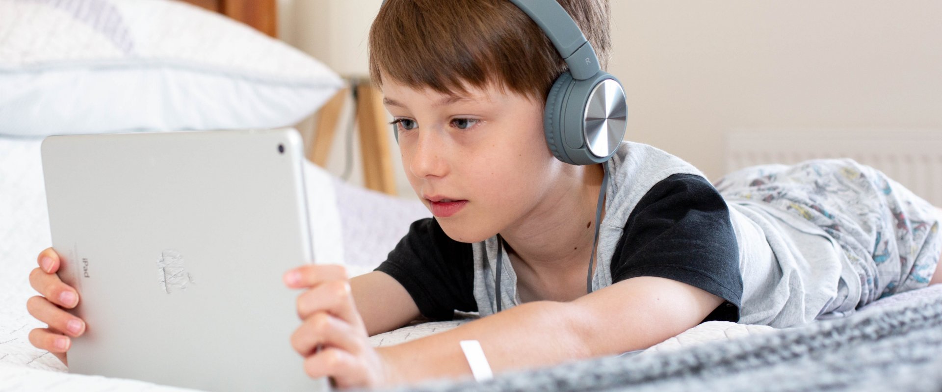 boy using tablet